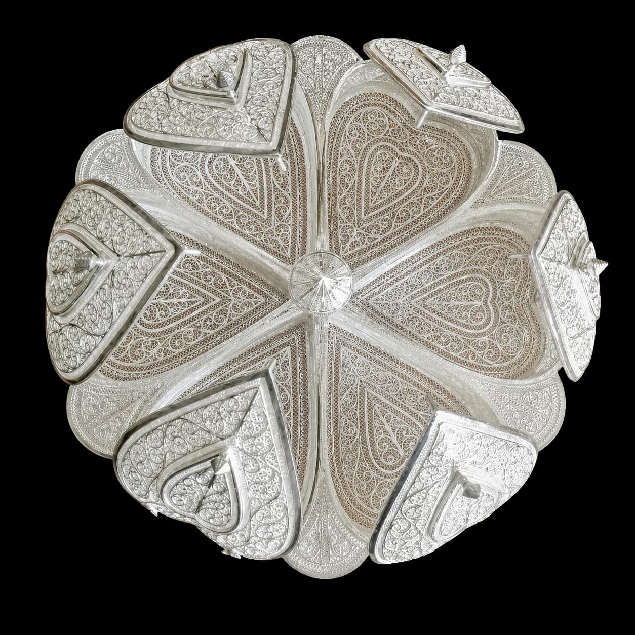 Flower-shaped silver filigree arrangement of six lidded heart-shaped compartments