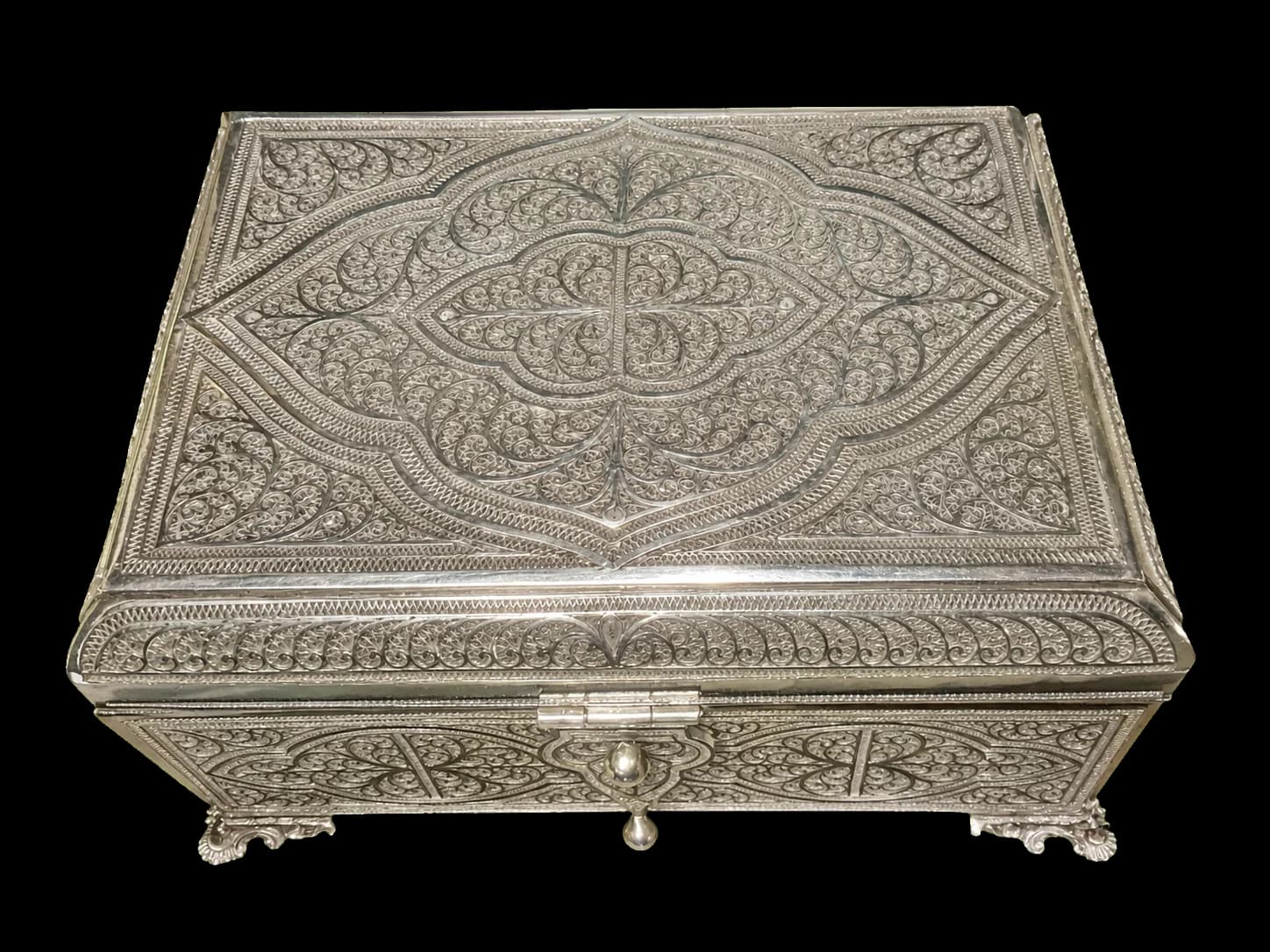 Hexagonal silver filigree jewellery box with a floral medallion lid